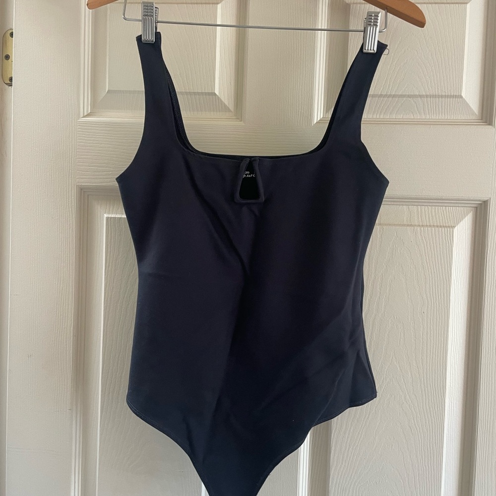 Black bodysuit with cute neckline detail
